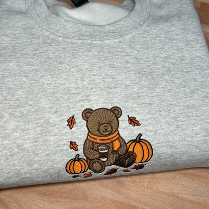 Gray embroidered sweatshirt with a teddy bear and fall pumpkin design